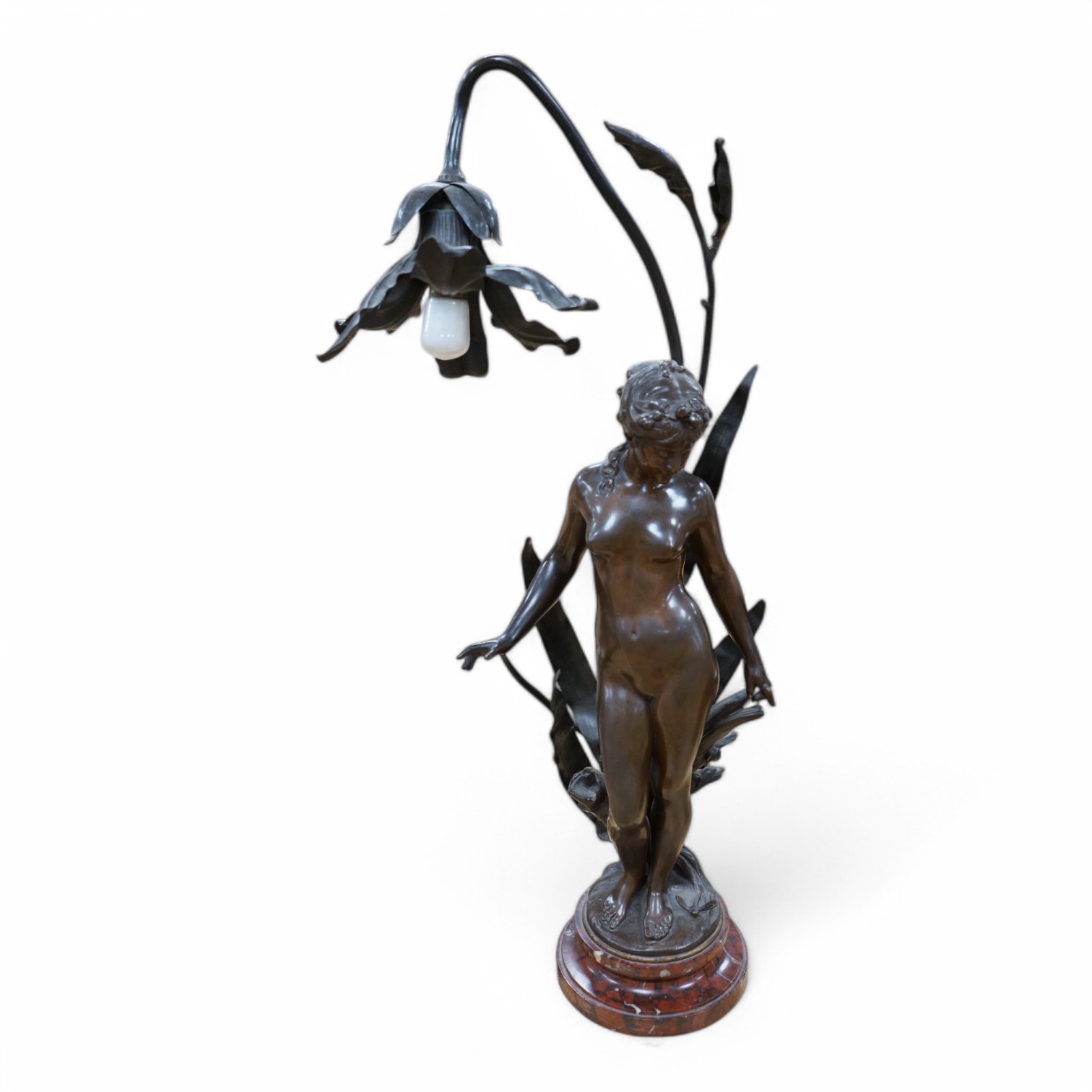 Auguste Moreau, a bronze figure of a nymph on a rouge marble base, later converted to a table lamp, 64cm high., Condition - good